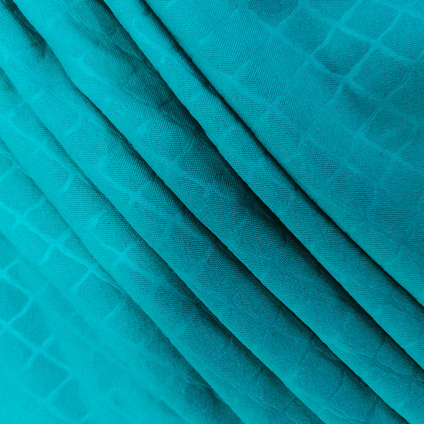 TMIE-11-03 85-90GSM Dyed Embossed Fabric